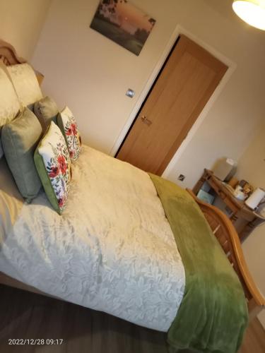 Ένα ή περισσότερα κρεβάτια σε δωμάτιο στο Rosegarth Bed and Breakfast