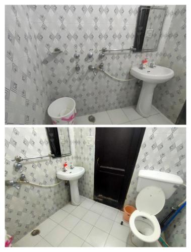 a bathroom with a sink and a toilet at New Chandigarh Holiday Home in Chandīgarh