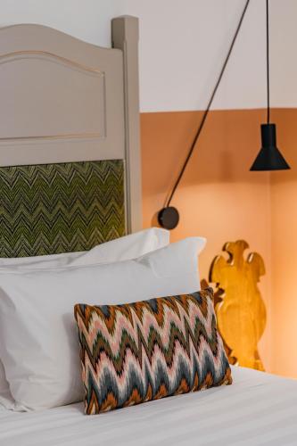 Hotel Priori Secret Gardenにあるベッド