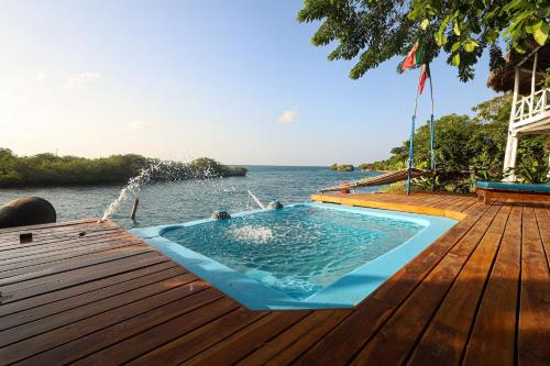 a swimming pool on the deck of a boat at Isla Mulata, Islas del Rosario in Isla Grande