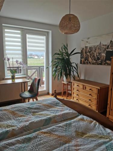 Katil atau katil-katil dalam bilik di Apartament Forest