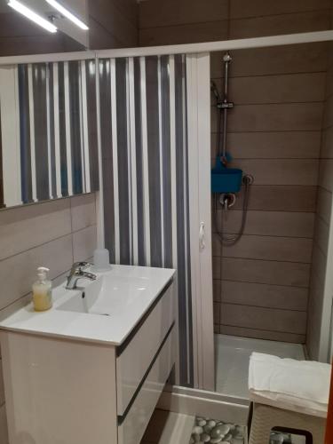 a bathroom with a sink and a shower at VASTO centro Alloggio 1-2-3 in Vasto