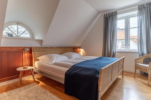 Postel nebo postele na pokoji v ubytování Nordlicht Reetdachhaus Nordlicht LUV