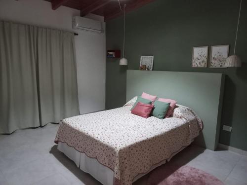 Ένα ή περισσότερα κρεβάτια σε δωμάτιο στο Quinta El Hornero