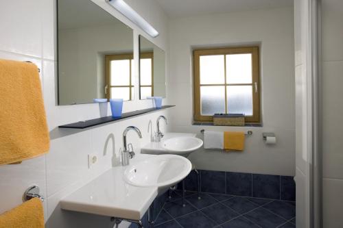 Kylpyhuone majoituspaikassa Appartements Birnbaumer