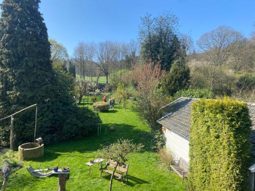 a view of a garden from the roof of a house at Natuurhuisje Heerlijkheid Beek in Berg en Dal