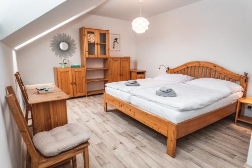 Postel nebo postele na pokoji v ubytování Summerhouse penzion Bavory