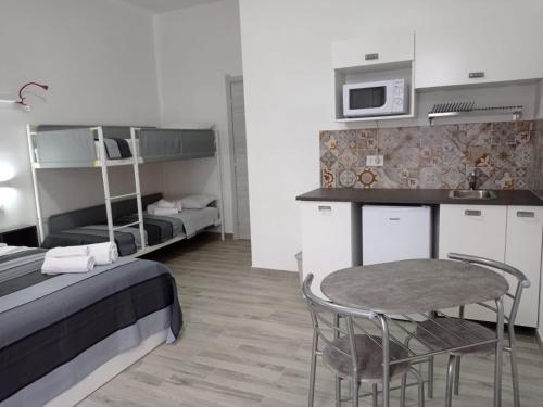 Kuchyň nebo kuchyňský kout v ubytování Ciccina Rooms