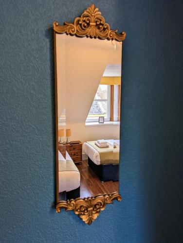 Letto o letti in una camera di The Coo's Guest House