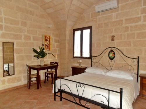 Postel nebo postele na pokoji v ubytování Il Corallo del Salento