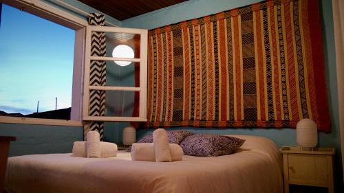 Ένα ή περισσότερα κρεβάτια σε δωμάτιο στο Guesthouse Évasion