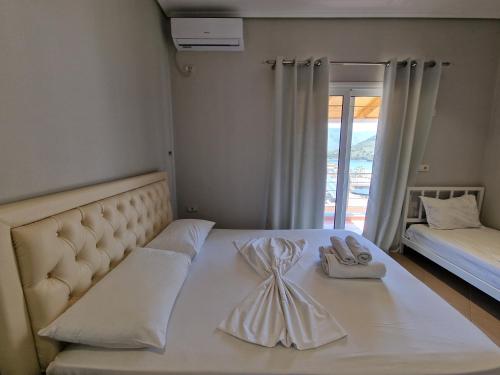 Cama o camas de una habitación en Villa Juli Ksamil