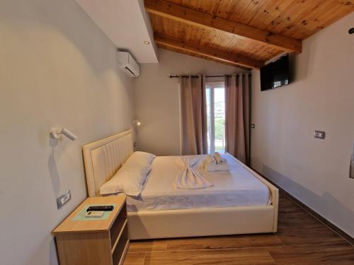 Cama o camas de una habitación en Villa Juli Ksamil