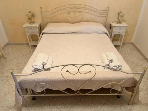 Postel nebo postele na pokoji v ubytování Villetta Annunziata, indipendente e panoramica nell' Isola di Lipari