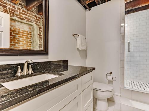 a bathroom with a sink and a toilet at Riverview Terrace in Savannah