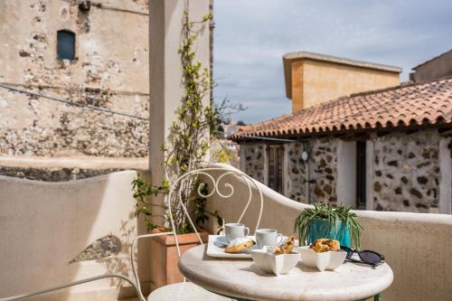 Foto dalla galleria di Domo Mea Terra e Domo Mea Chelu - Comfort nel centro storico di Orosei a Orosei