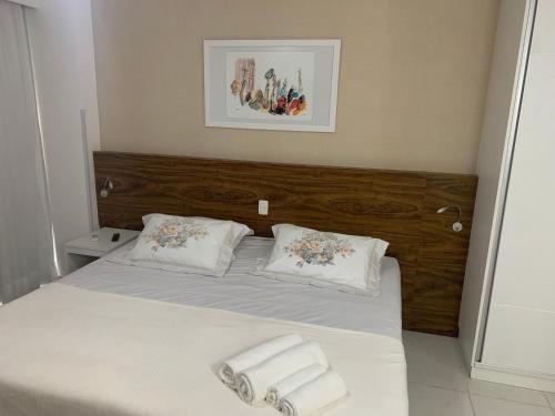 En eller flere senge i et værelse på KMT Comfort Flat