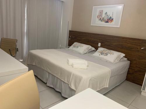 En eller flere senge i et værelse på KMT Comfort Flat