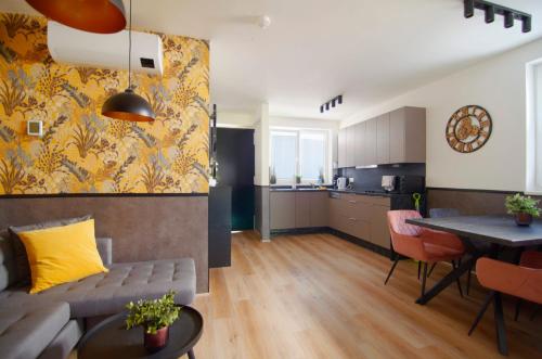 Kuchyň nebo kuchyňský kout v ubytování MH Apartments
