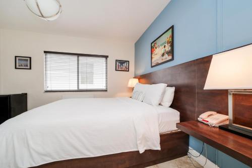 Ένα ή περισσότερα κρεβάτια σε δωμάτιο στο Starlite Hotel