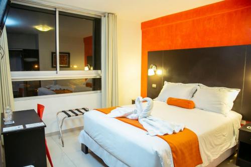 Cama o camas de una habitación en Hotel Killari Trujillo