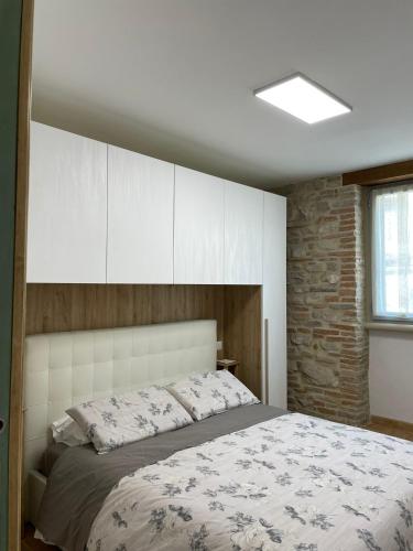Ένα ή περισσότερα κρεβάτια σε δωμάτιο στο Casa la Rosa