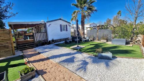 Zahrada ubytování Mobil home 6 personnes camping 4* Les Pins Maritimes