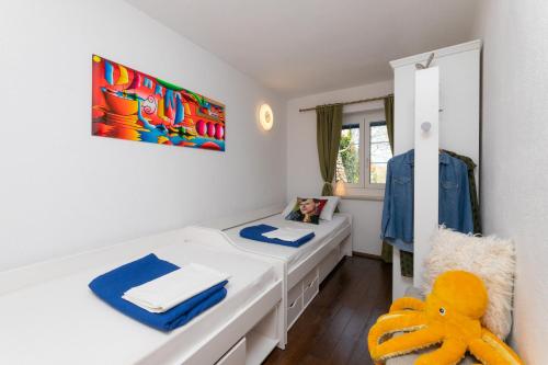 En eller flere senge i et værelse på "Villa Kostela"-Villa in nature with 4 bedrooms, 2 bathrooms and 2 kitchens