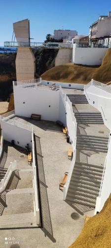 a building under construction with stairs on the ground at AlbufeiraSun, arrive as a guest leave as a friend. in Albufeira