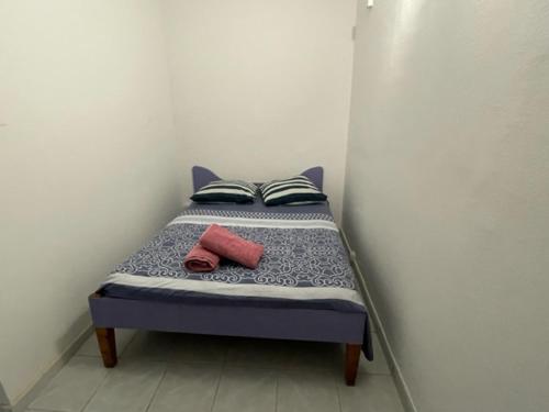 Katil atau katil-katil dalam bilik di Residence Chez Marraine Maison BERTILI