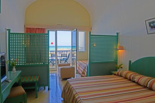 Postel nebo postele na pokoji v ubytování Hotel Meninx Djerba
