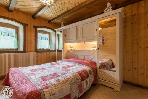 Ένα ή περισσότερα κρεβάτια σε δωμάτιο στο Chalet la griotte