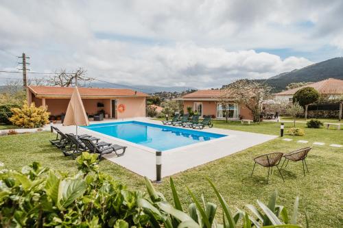 an image of a villa with a swimming pool at Forno House - O Lagar in Vila Praia de Âncora