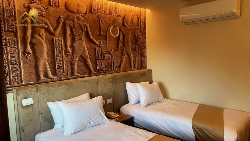 Katil atau katil-katil dalam bilik di Pyramids sunrise inn