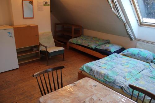 Cama o camas de una habitación en Chalupa Pod Melechovem