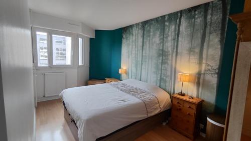 Posteľ alebo postele v izbe v ubytovaní Appartement 100m2 près du métro et aéroport
