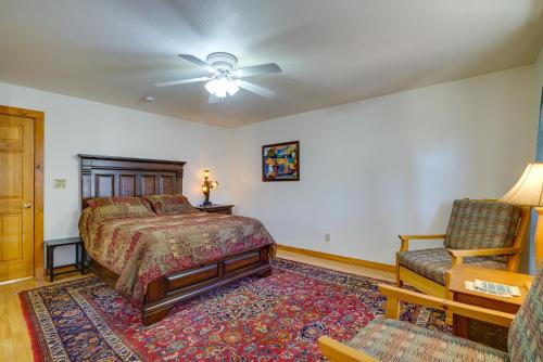 a bedroom with a bed and a couch and a chair at Cozy Las Cruces Home - 2 Mi to New Mexico State! in Las Cruces