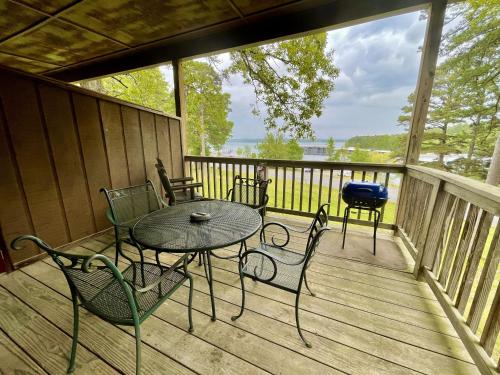Lake view queen guest room with two queens, sleeper sofa and patio overlooking Lake Ouachita, Hotel Room