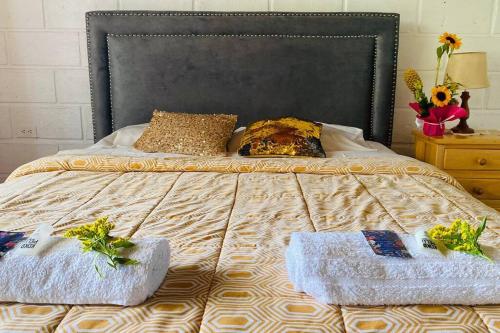 Een bed of bedden in een kamer bij Casa Entera Hermosa