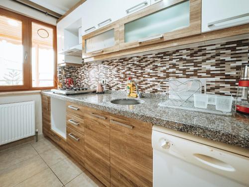 a kitchen with a sink and a counter top at YILDIRIM LIFE APART in Istanbul