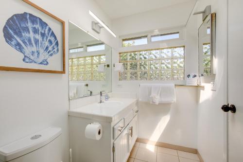a bathroom with a sink and a toilet at Lakefront Grover Beach Home about Walk to Ocean! in Grover Beach