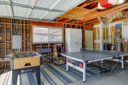 a room with a ping pong table in it at Lakefront Grover Beach Home about Walk to Ocean! in Grover Beach