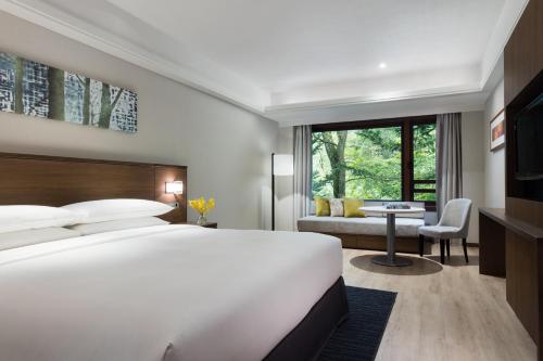 a hotel room with a bed and a desk at Karuizawa Marriott Hotel in Karuizawa