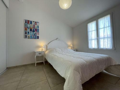 Postel nebo postele na pokoji v ubytování Maison Saint-Denis-d'Oléron, 6 pièces, 10 personnes - FR-1-246A-226