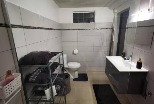 Koupelna v ubytování Bas de villa