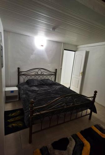 Postel nebo postele na pokoji v ubytování Bas de villa
