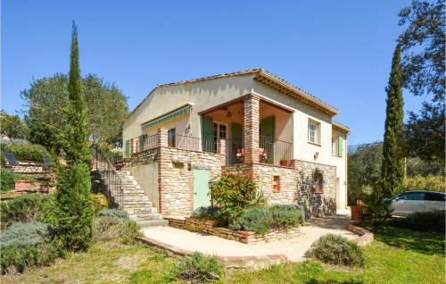 a house with a staircase leading up to it at Cozy Home In Méjannes-Lès-Alès in Méjannes-lès-Alès