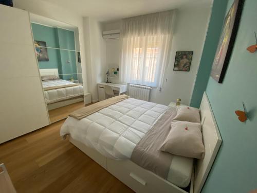 Posteľ alebo postele v izbe v ubytovaní Appartamento di lusso in centro storico Palermo