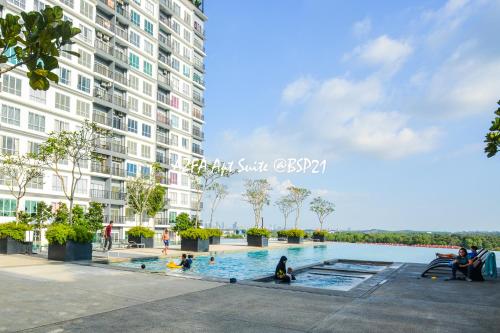 an image of a swimming pool in front of a building at Bandar Saujana Putra BSP 21 AZFA Suite [FREE WiFi] in Jenjarum
