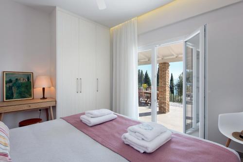 Postel nebo postele na pokoji v ubytování Lucky Villas